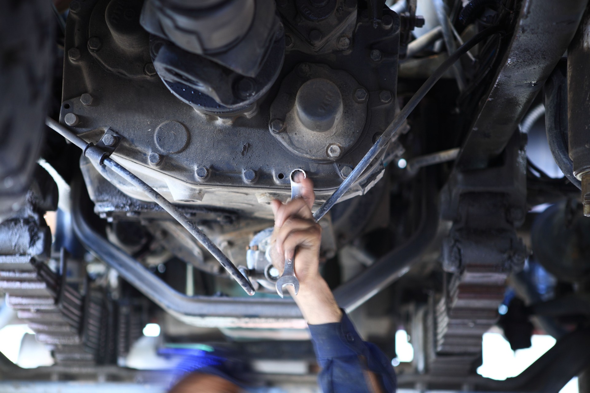 Mechanic under a truck